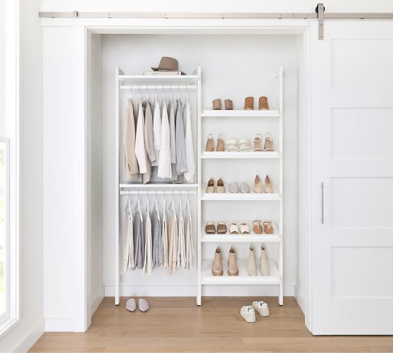 https://assets.pbimgs.com/pbimgs/rk/images/dp/wcm/202332/0877/essential-reach-in-closet-by-hold-everything-5-hanging-sys-c.jpg