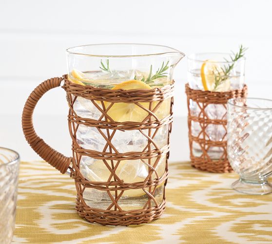 https://assets.pbimgs.com/pbimgs/rk/images/dp/wcm/202332/0894/handwoven-wicker-and-glass-pitcher-c.jpg
