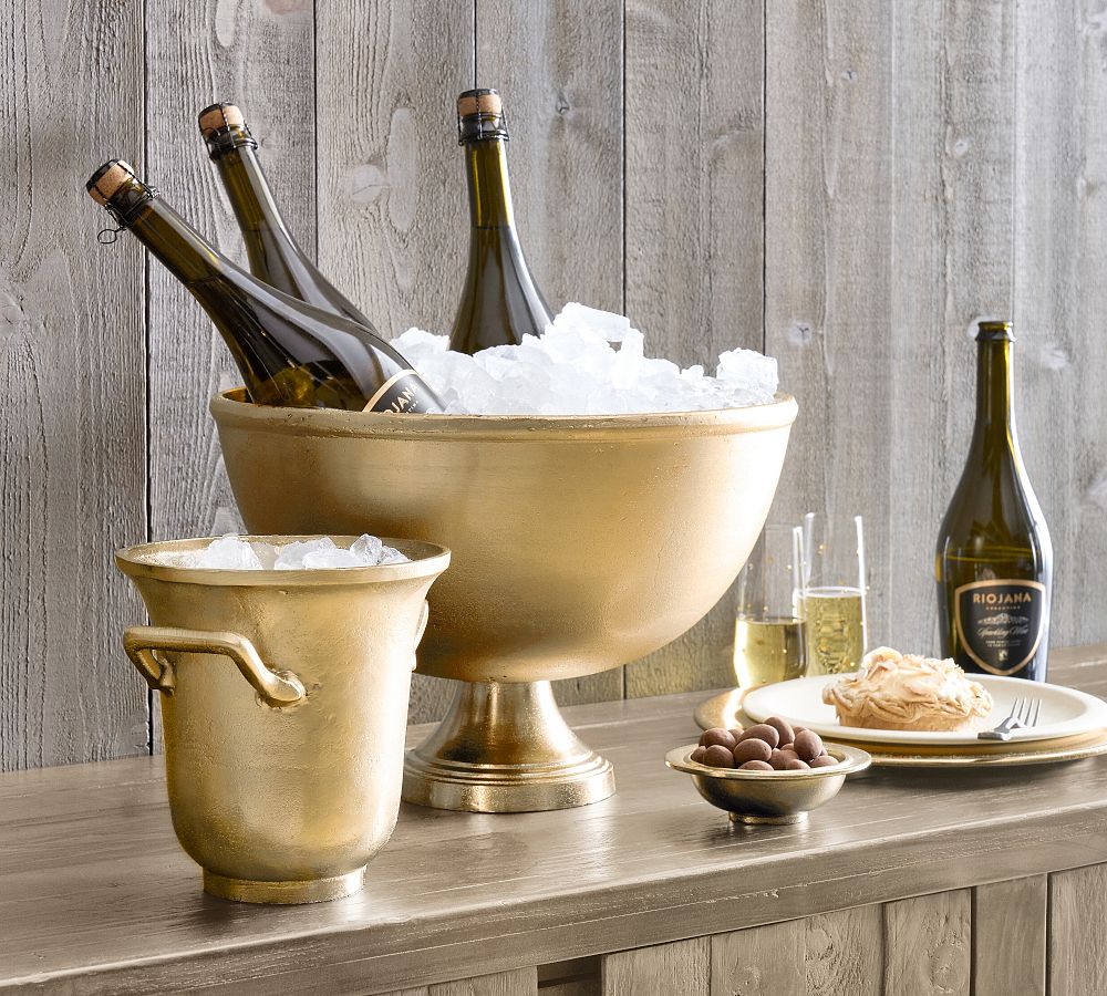 https://assets.pbimgs.com/pbimgs/rk/images/dp/wcm/202340/0200/rustic-metal-handcrafted-footed-champagne-bucket-l.jpg