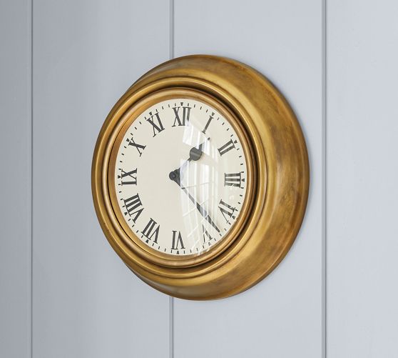 How to Make a Stunning Statement with Large Wall Clocks - Town & Country  Living