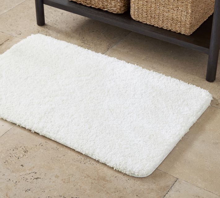 Need a bath rug that feels plush and dries fast? Step onto this memory foam  mat users say 'feels like a cloud' and tout as the 'most comfortable bath  rug ever' 