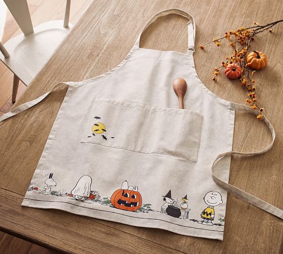 Peanuts™ Pumpkin Carving Oilcloth Adult Apron Pottery Barn