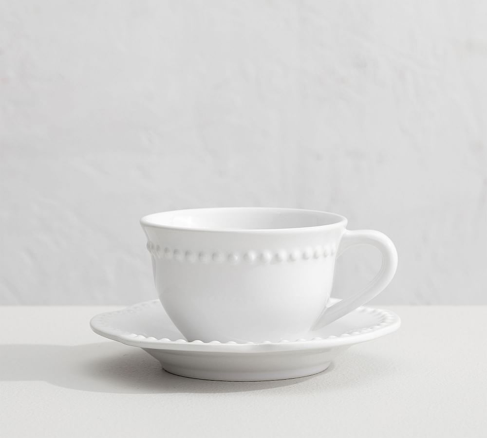 https://assets.pbimgs.com/pbimgs/rk/images/dp/wcm/202349/0169/emma-beaded-stoneware-cup-and-saucer-sets-1-l.jpg