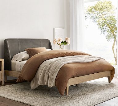 Wood and leather store bed frame