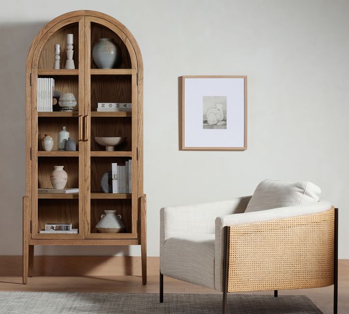 Arched cabinet deals with glass doors