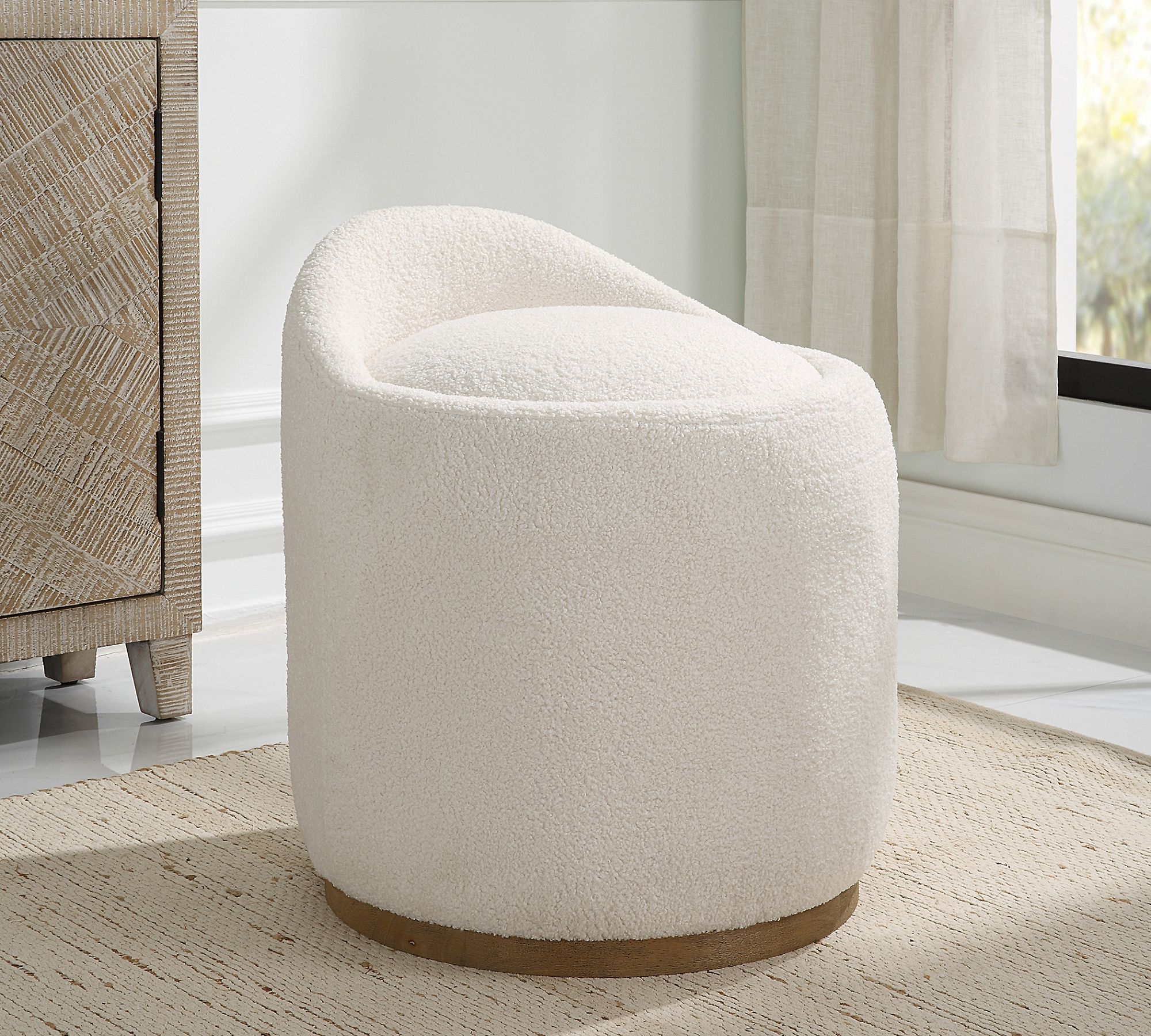 Berrie Upholstered Swivel Ottoman