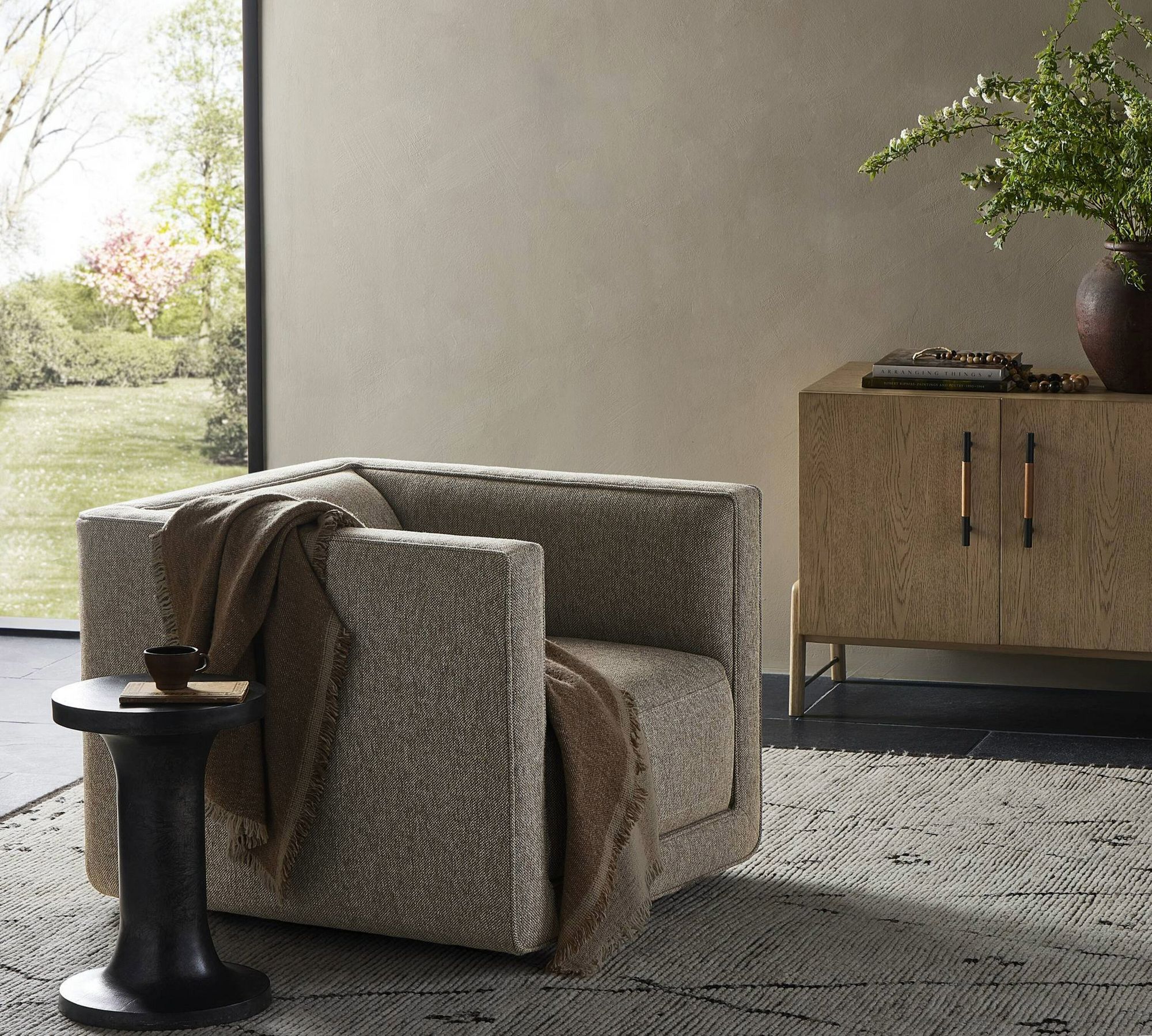 Canfield Upholstered Swivel Armchair