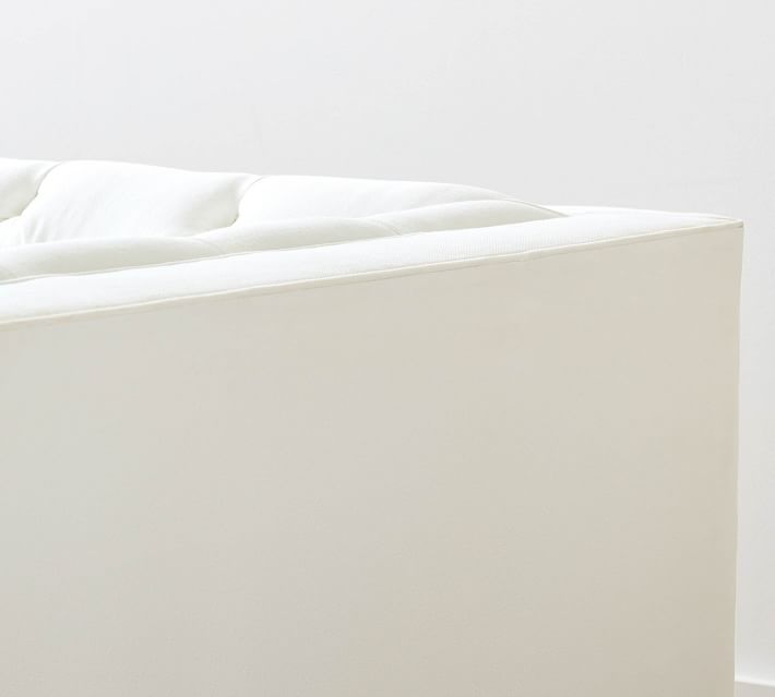 Close-up of white sofa cushion edge