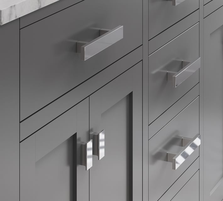 Close-up of cabinet drawer with metal handle.
