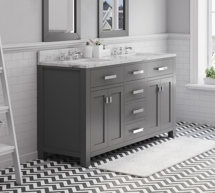 A dark gray bathroom vanity with marble countertop and multiple drawers, viewed from side.