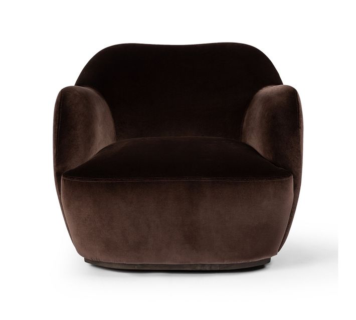 Brown velvet armchair with wide seat and rounded arms, front view