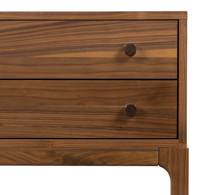 Front of the dresser with two drawers and knobs.