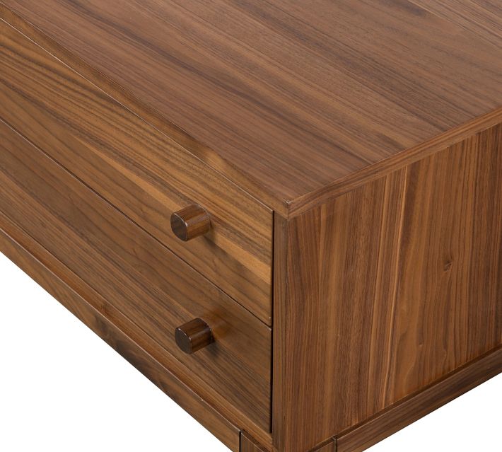 Top-left corner showing two drawers with handles and wood grain.