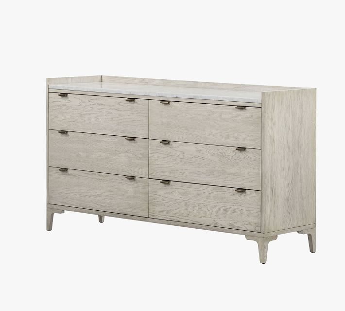 Three-quarter view of dresser with six drawers and slender legs