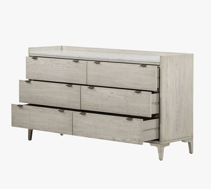 Side-open drawer showing a stack of three rows of drawers in a dresser