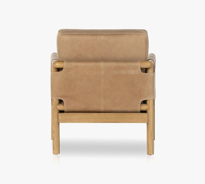 Front view of armchair with leather upholstery and wooden legs