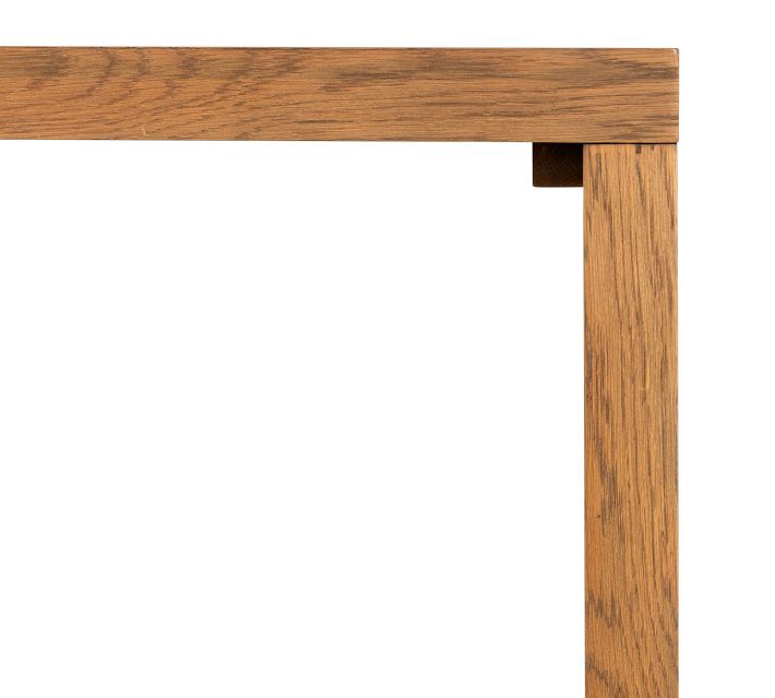 Corner of desk with leg and underside join.