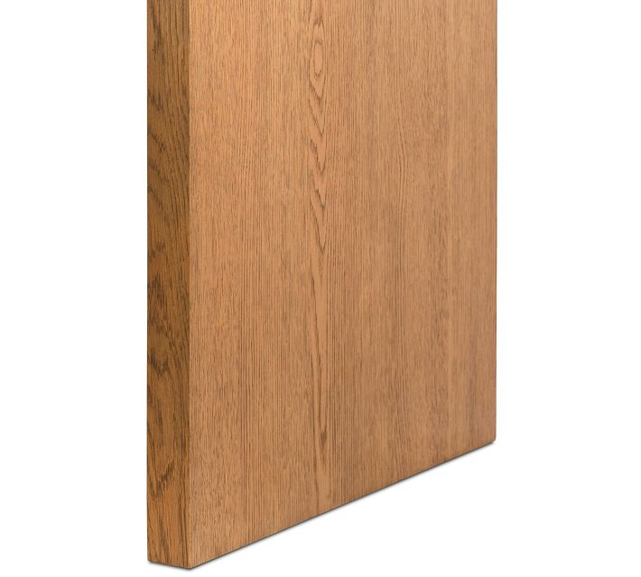 Side panel of desk showing wood grain and edge.