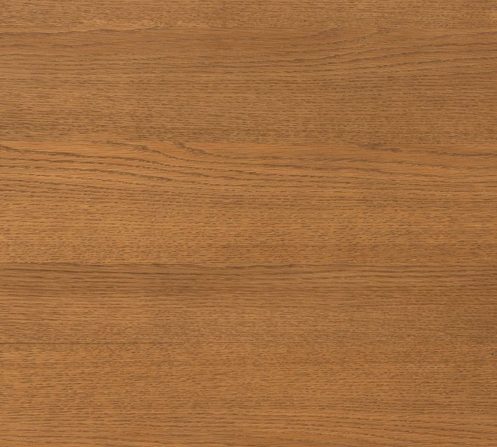 Close-up of rich wood grain on desk surface.