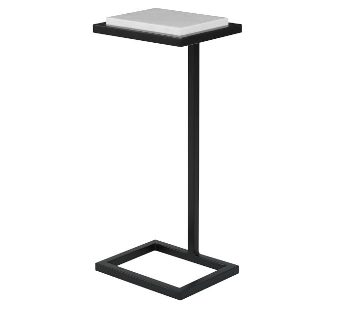 Close-up of the table top showing a two-tier square design with a marble top and black base.