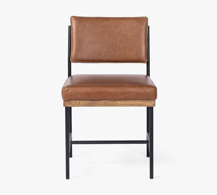 Single tan brown leather upholstered bar chair with black metal frame and wooden seat support facing forward.