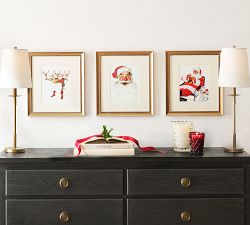Santa's Milk and Cookies Framed Print by Norman Rockwell