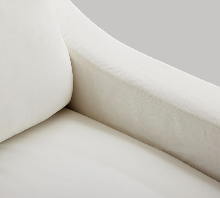 Close-up of armrest seam and stitching on the sofa