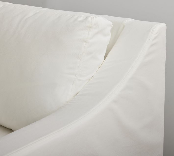 Right arm of sofa with cushion and fabric details