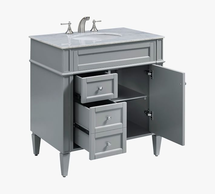 Open vanity with drawers and cabinet visible