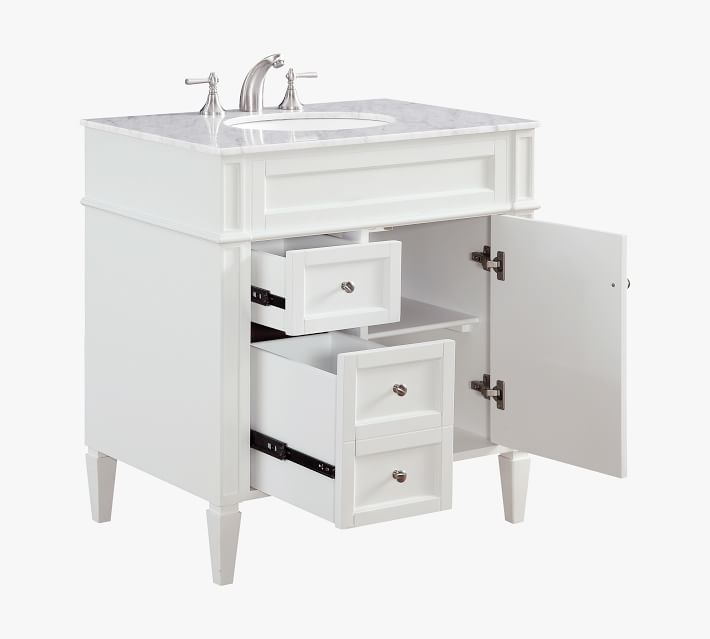 Interior of vanity with open cabinet and multiple drawers