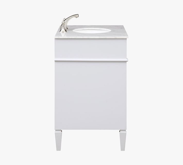 Single vanity with marble top and faucet from front