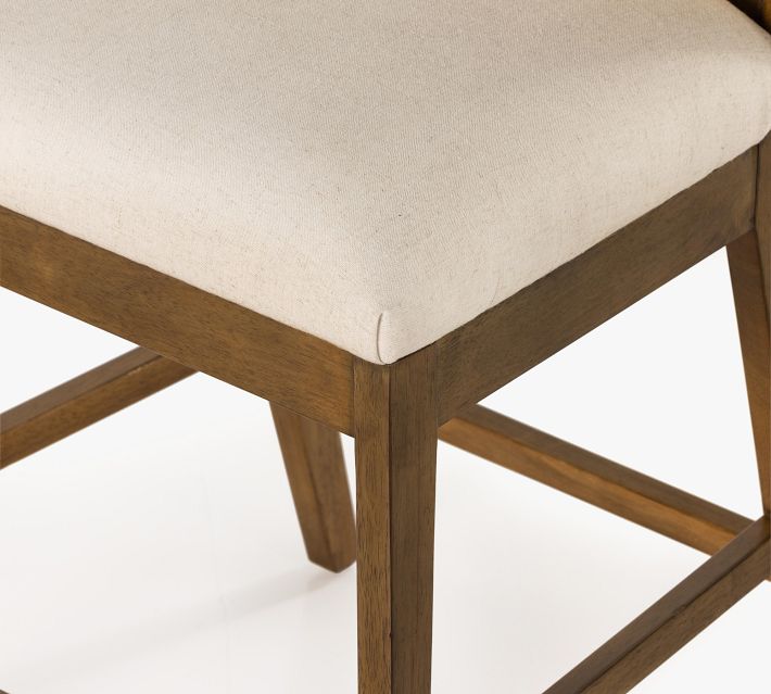 Close-up of upholstered seat edge
