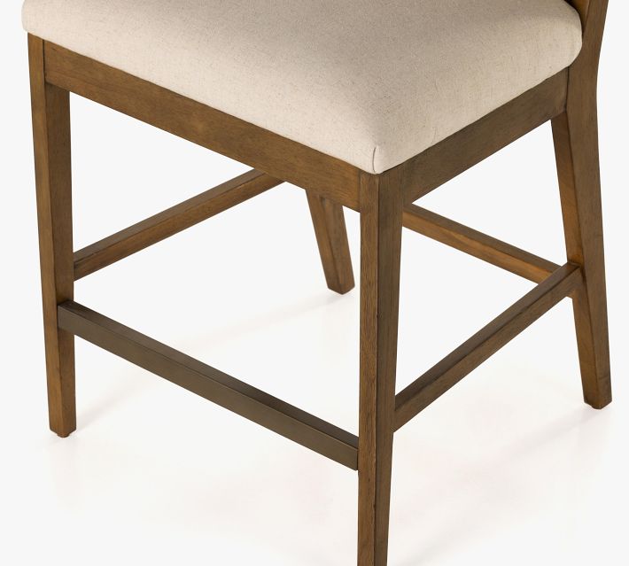 Bottom corner of chair showing legs and crossbar
