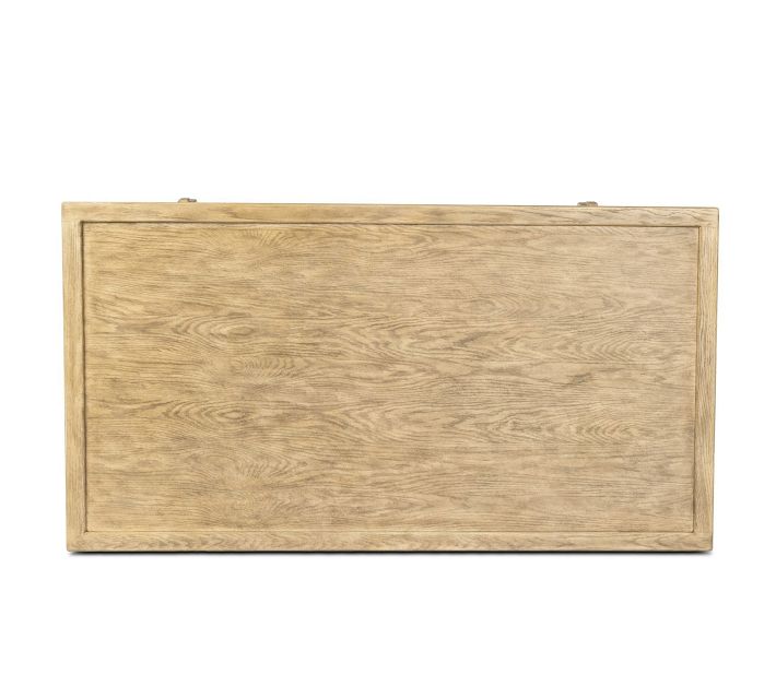 End view of wooden coffee table showing side panel and wood grain