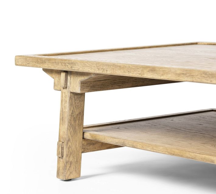 Lower left side of coffee table with leg and shelf joint