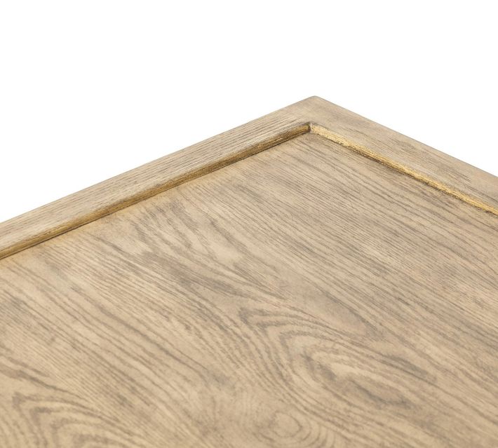 Close-up of tabletop corner showing bevel and wood grain