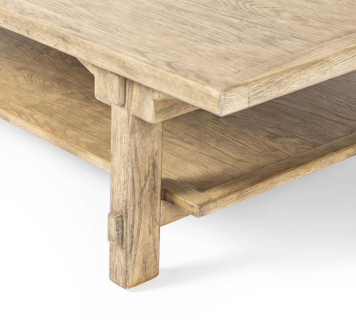 Detailed view of leg joint and shelf support under coffee table