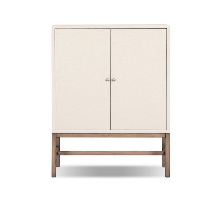 Cream/off-white cabinet with two doors on a wooden stand.