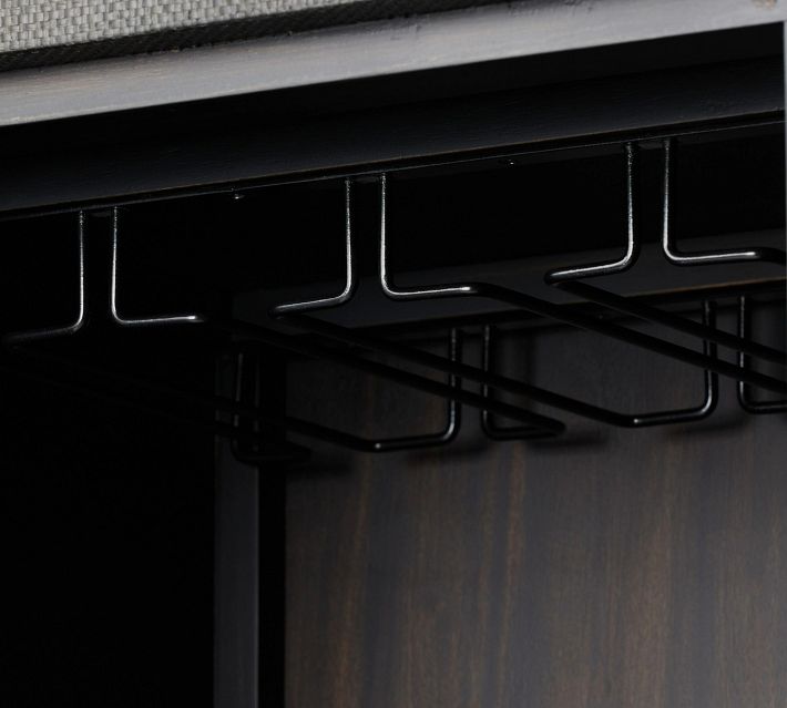 Close-up underside rack area of a cabinet showing metal wiring for glass rack or hanging items.