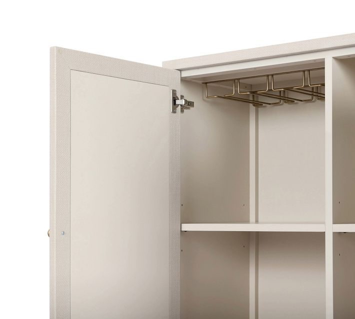 Open cabinet interior with hanging rack and shelf configuration.
