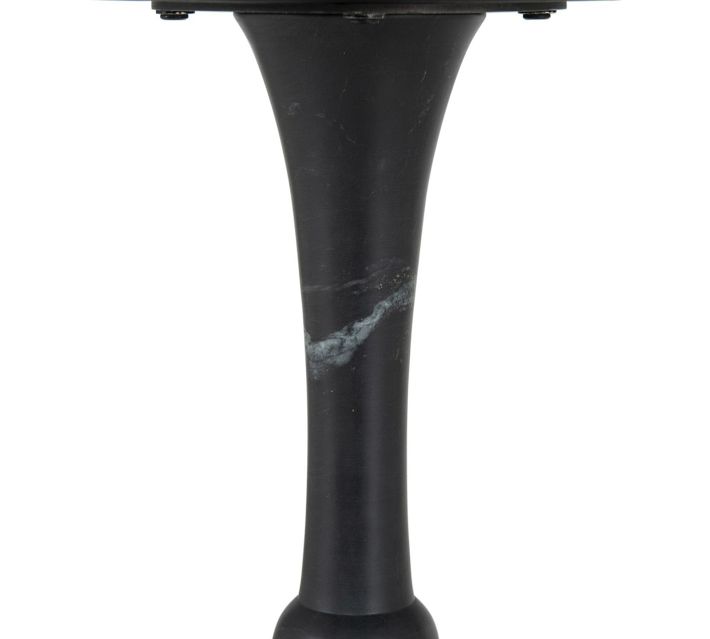 Close-up of the black painted pedestal leg of the round marble table.
