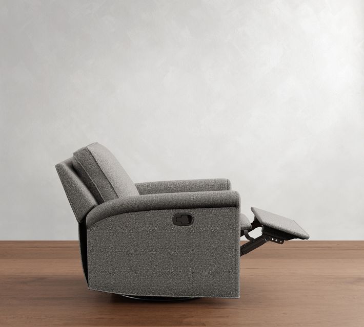 Right side view of a gray recliner with footrest extended outward.