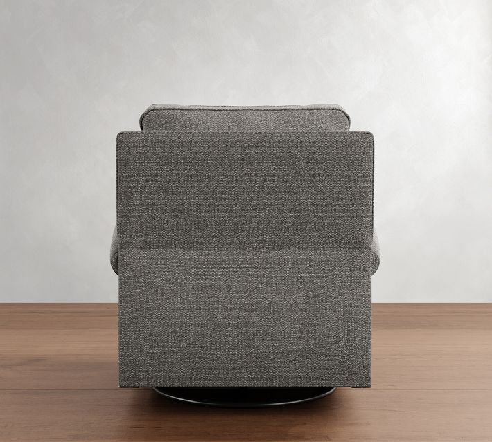 Back view of a gray upholstered modular armchair with integrated headrest.