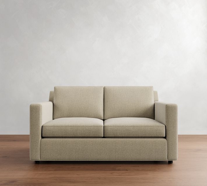 Front view of larger sofa with chaise-like base