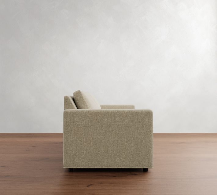 Side profile of sofa in studio