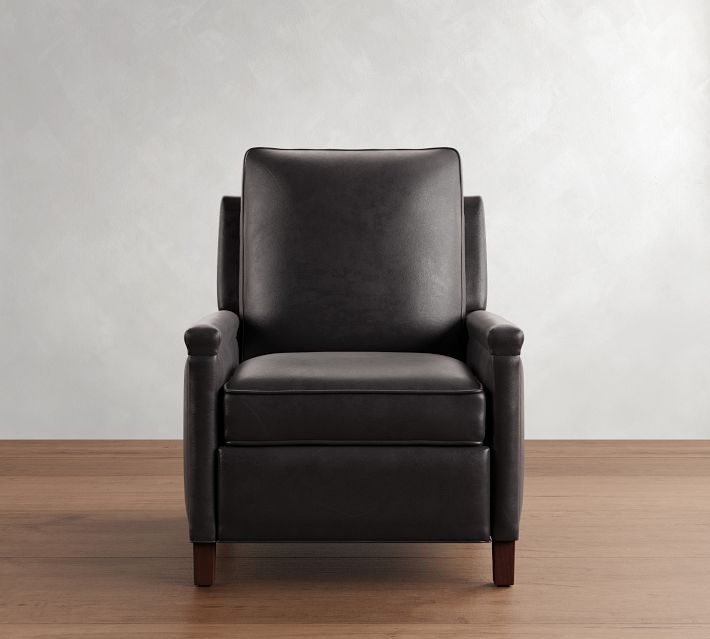 Black leather armchair with wooden legs, front view.