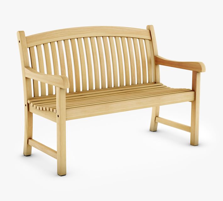A close view of a wooden slatted back bench with vertical slats and armrests.