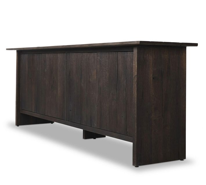 Angled view of dark wood sideboard showing overall size and silhouette