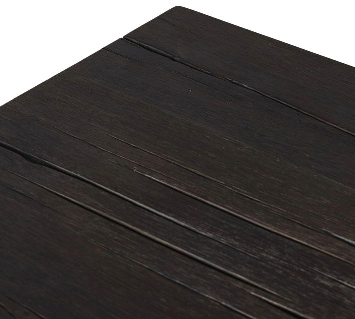 Top surface of dark wood sideboard showing wood grain and joints