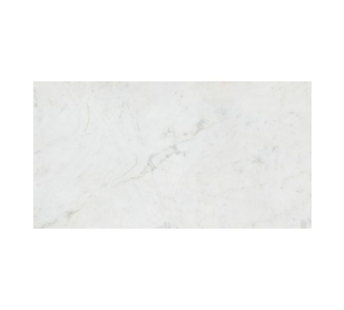 White marble surface with subtle gray veining.